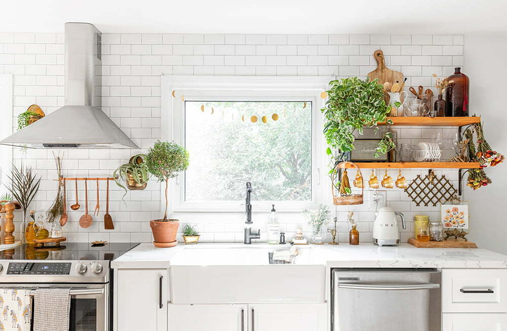 a kitchen with white cabinets