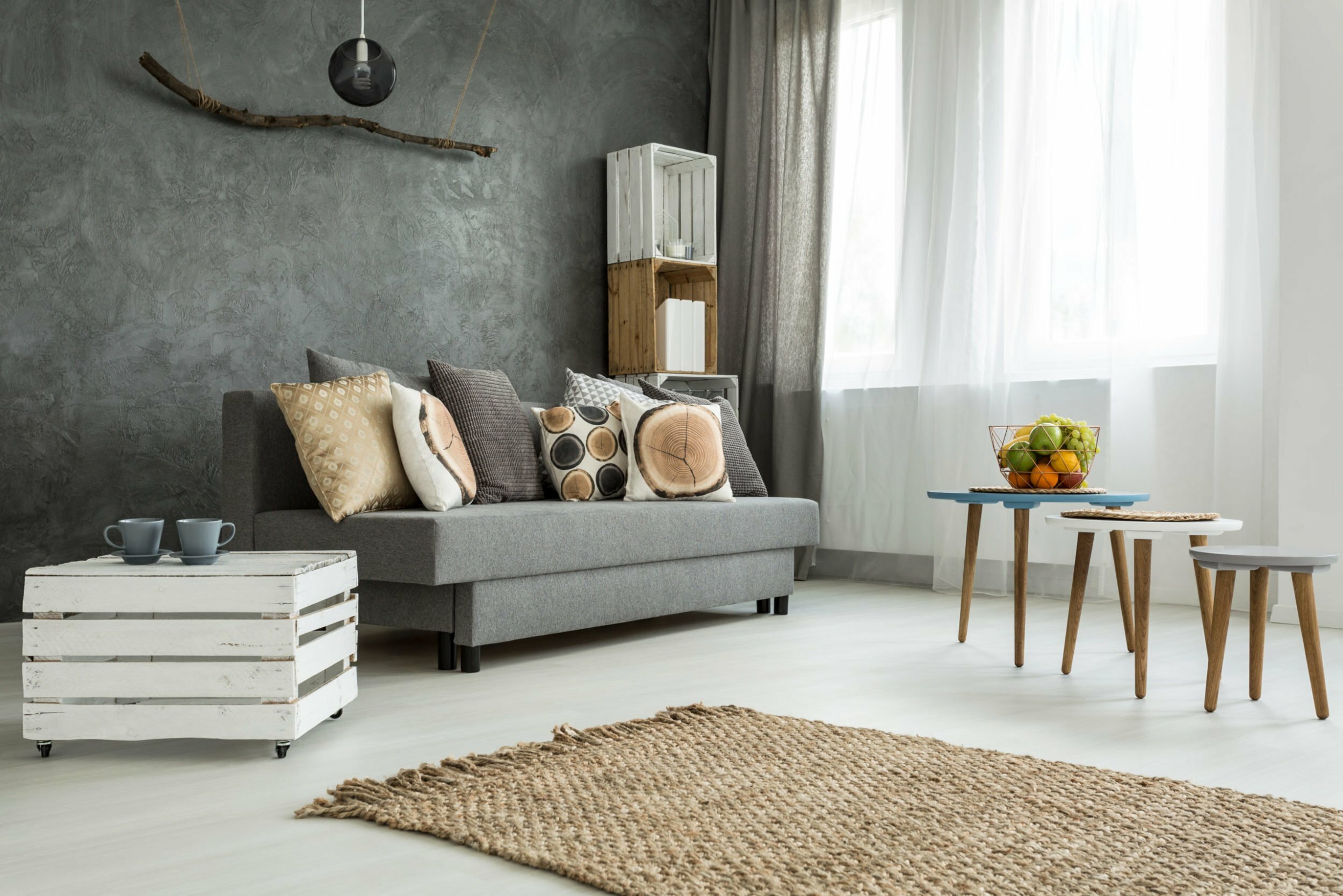 a living room with a couch and coffee table
