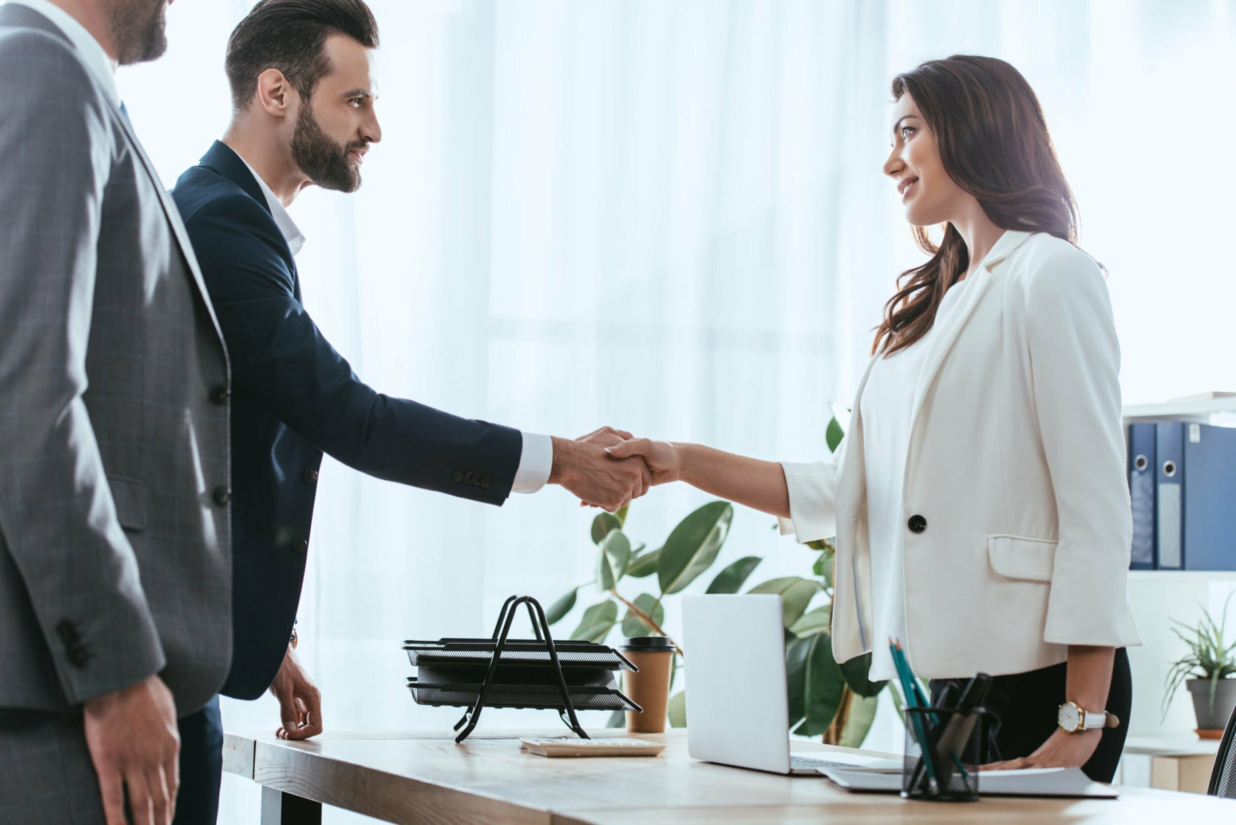 a man and a woman shaking hands