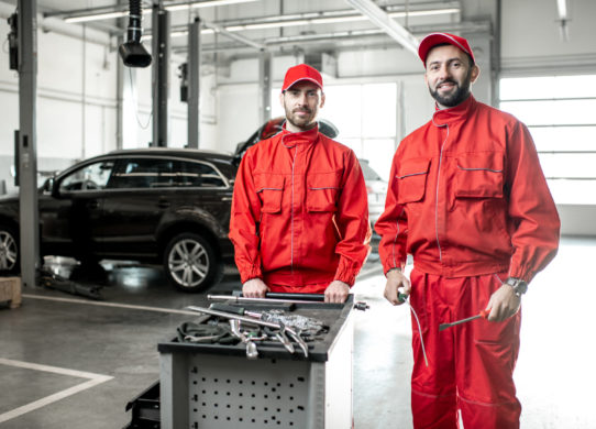Portrait of an auto mechanics indoors